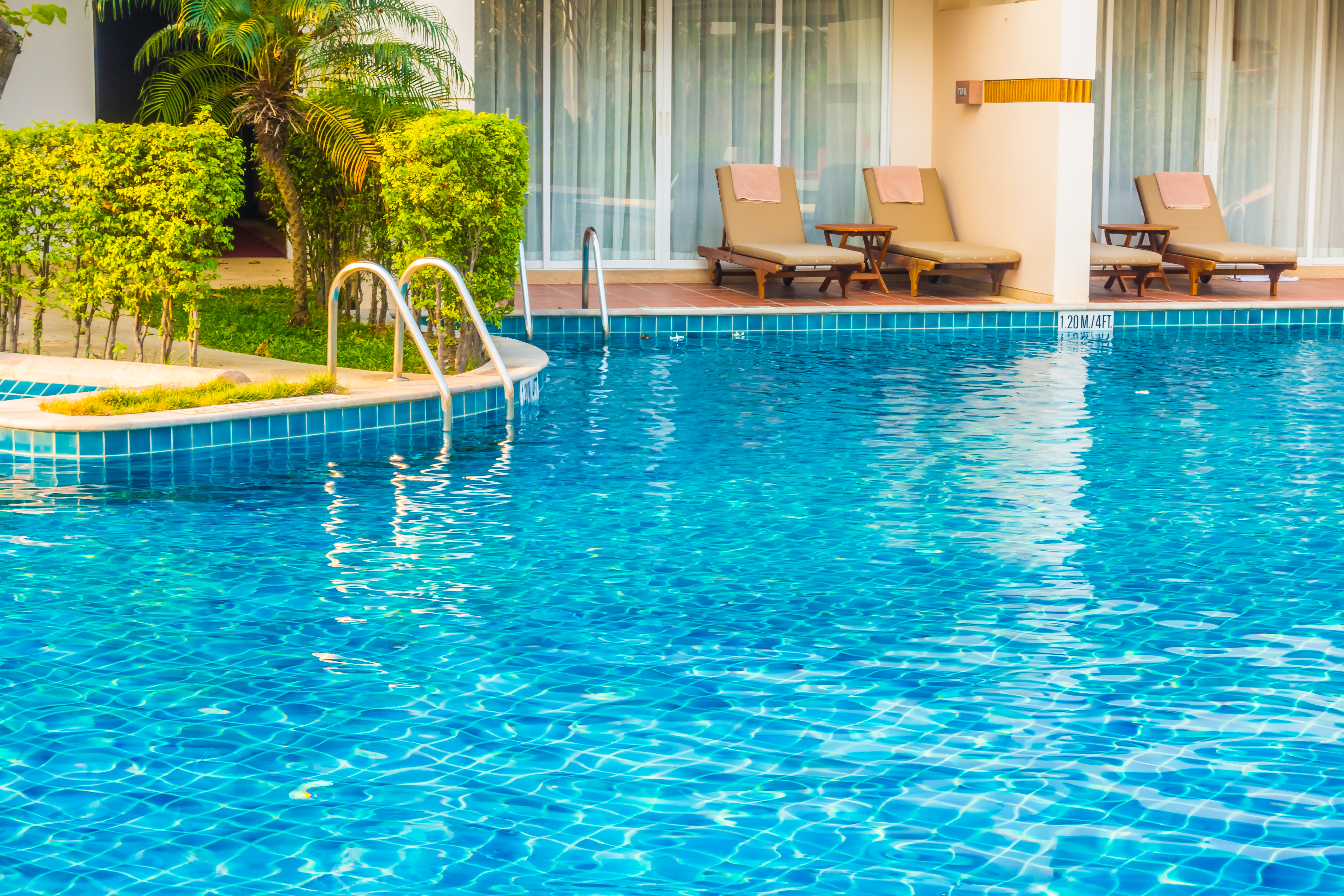 Professional commercial pool facility with pristine maintenance